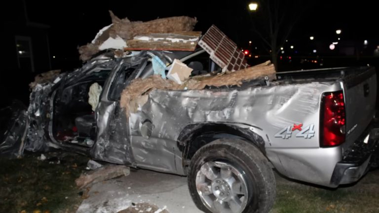 Fleeing Murder Suspect Crashes Through A House