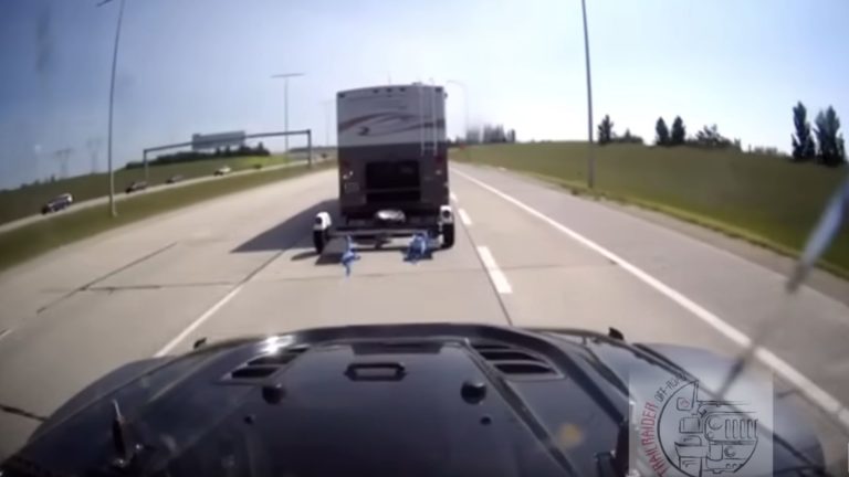 Jeep Comes Off A Trailer And Drives Itself