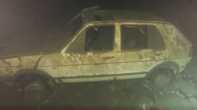 Mysterious Car Graveyard In Italian Lake