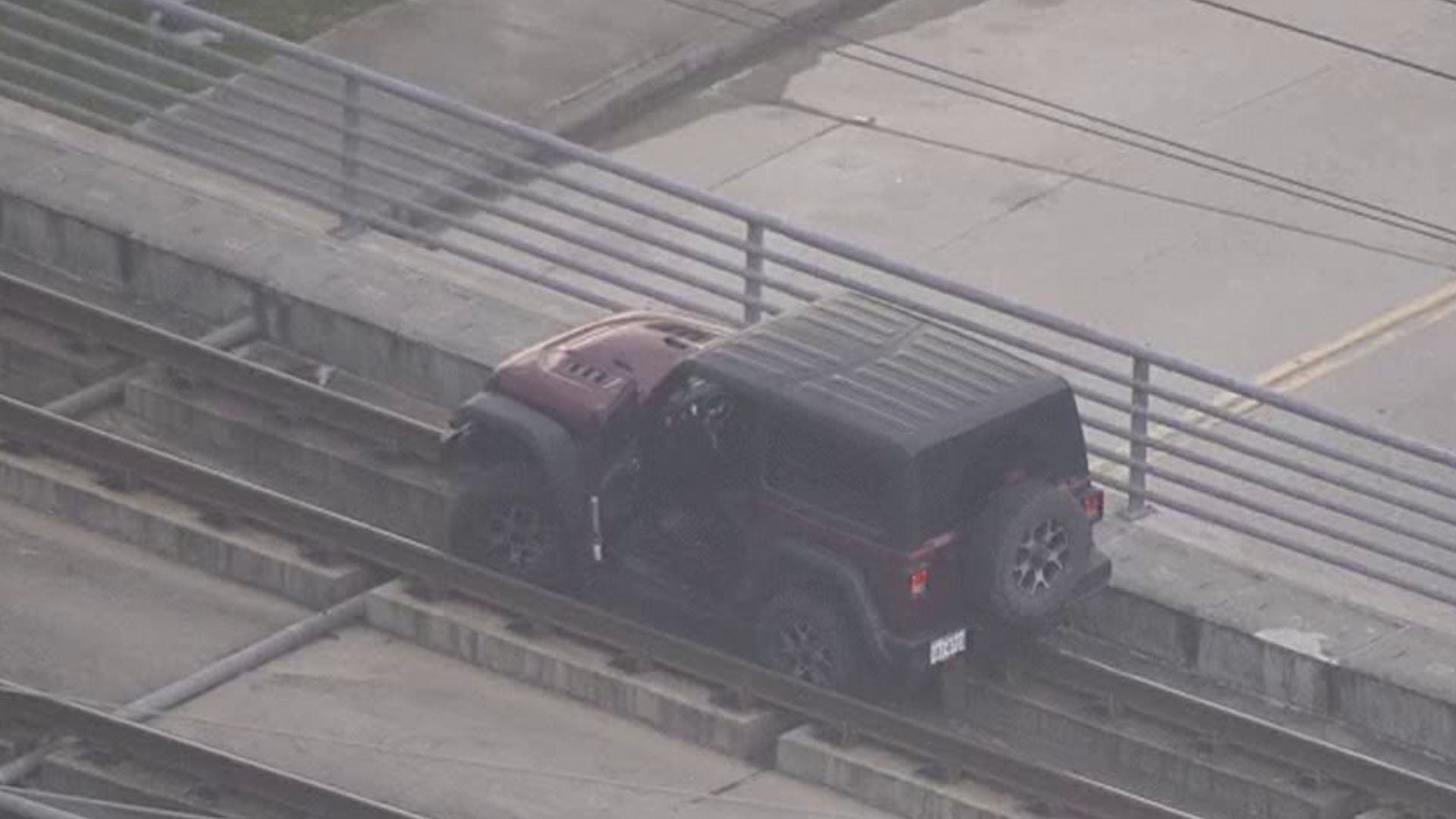 Jeep Gets Stuck On Huston Metrorail Tracks