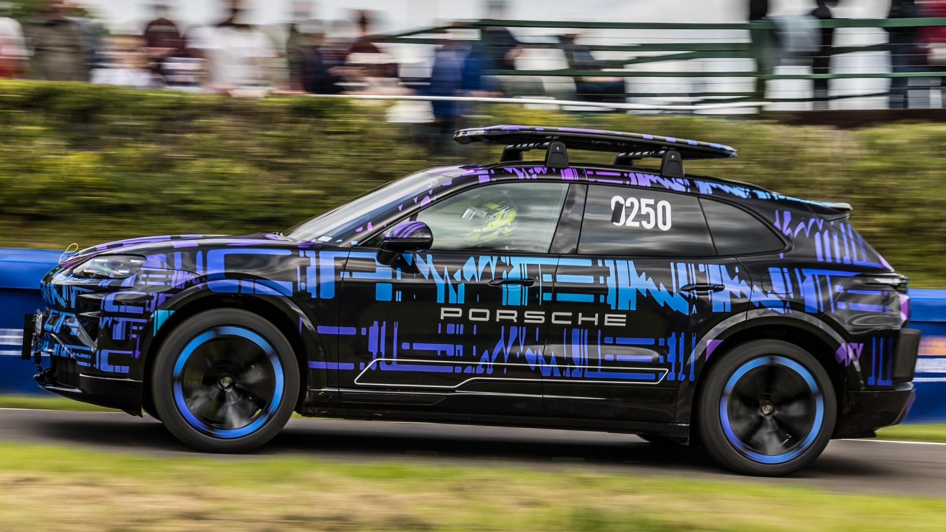 Camouflaged Porsche Cayenne Electric Competes In A Hill Climb