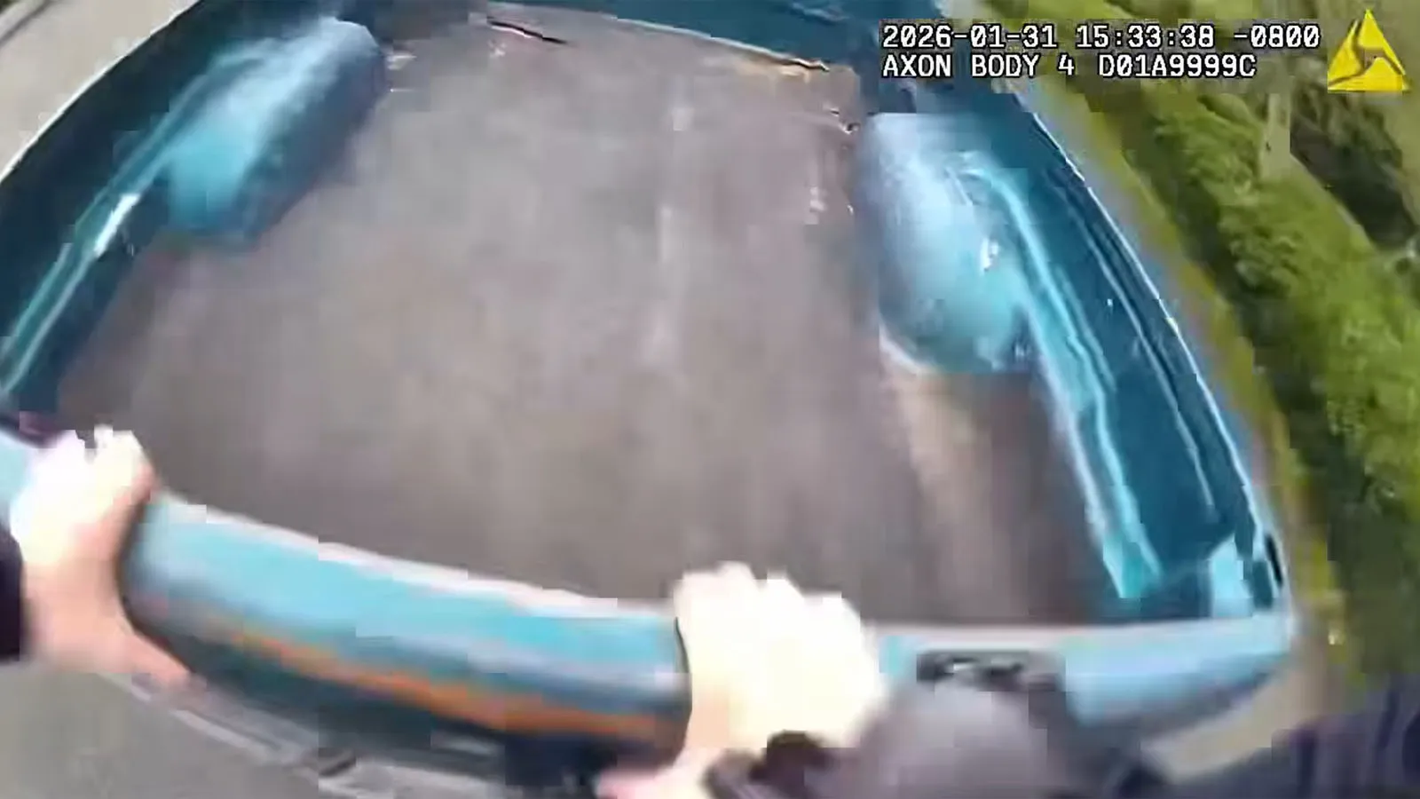 Police-Officer-Hops-in-Back-of-Pickup-to-Catch-Suspect-on-Bicycle