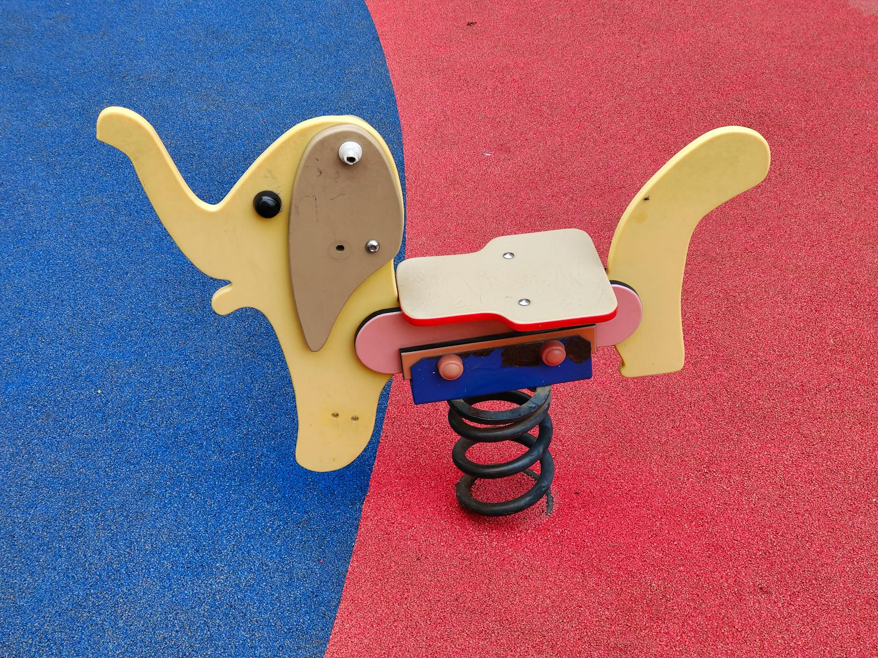 a spring rider on a playground