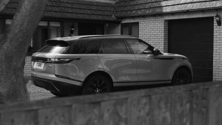 range rover velar in the driveway of the house