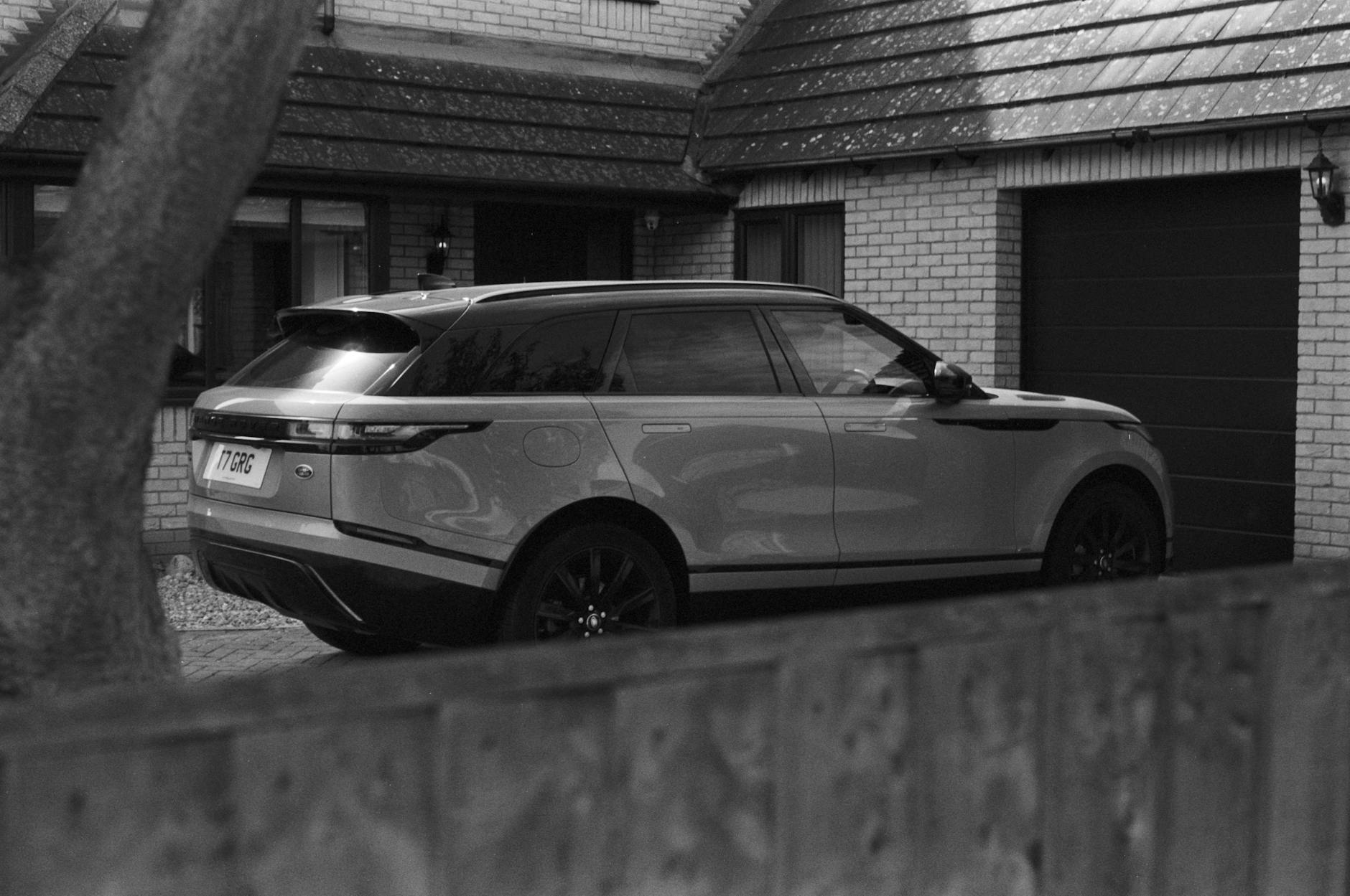 range rover velar in the driveway of the house