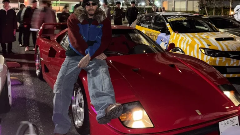 Lewis Hamilton with his red Ferrari F40 at a car meet in Tokyo, Japan