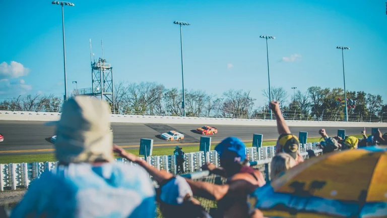 people watching car race