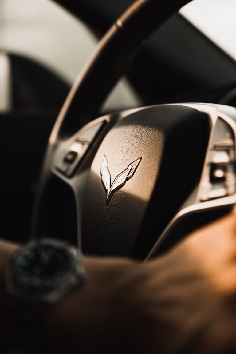 black and silver car steering wheel