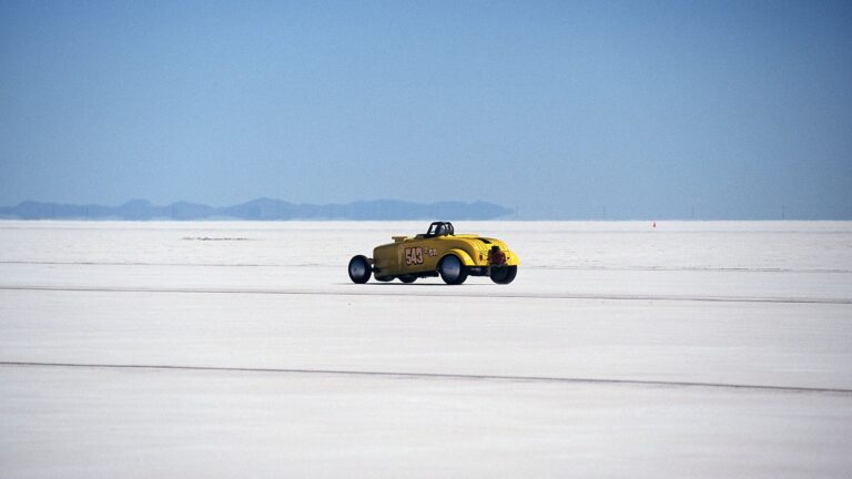 Yellow hot rod racing on Bonneville salt flats in Utah - Photo by mysurrogateband on Pexels