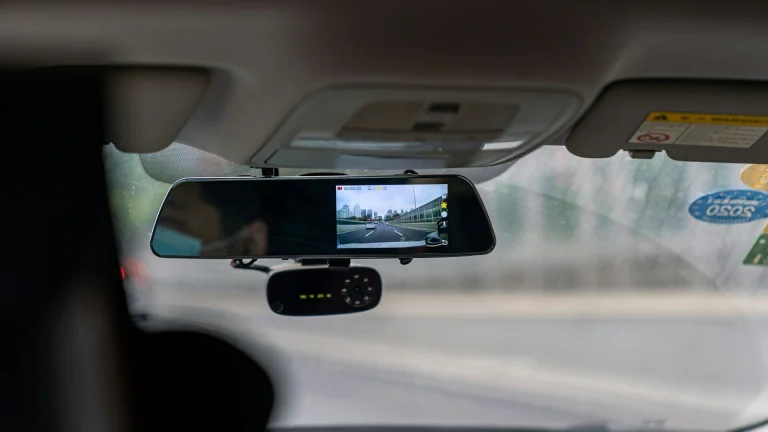 car side mirror with water droplets