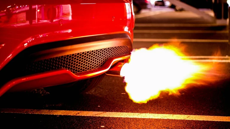 red car blowing turbo