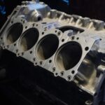 A close up of an engine block on a table