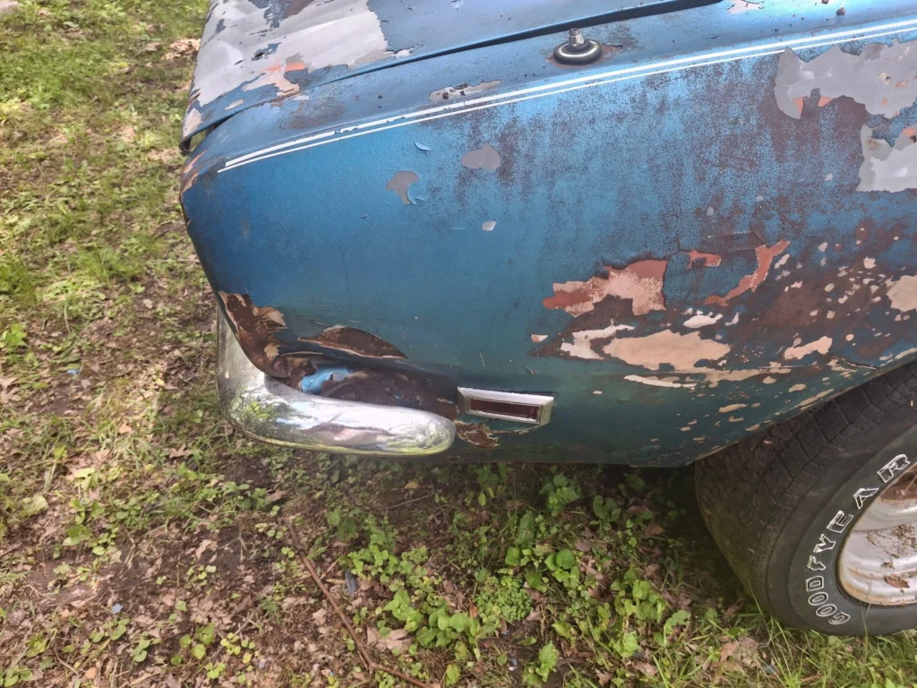 Rear quarter panel rust close-up on the 1968 Chevrolet Camaro restomod project car, from eBay listing by seller tkk0522
