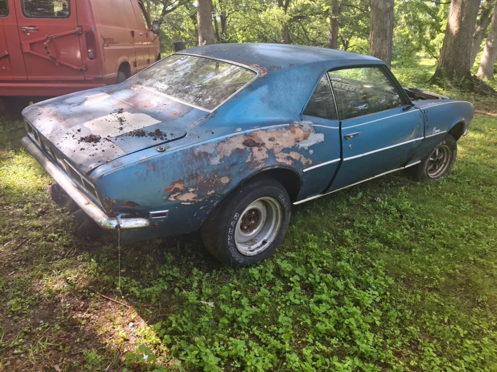 1968 Chevrolet Camaro restomod project car, rear quarter view showing body rust, from eBay listing by seller tkk0522