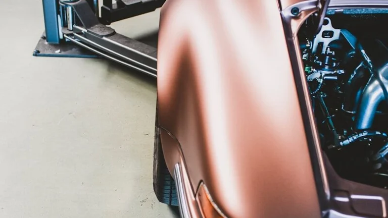 brown car in a garage