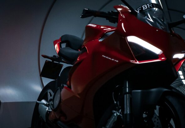 red and black sports bike