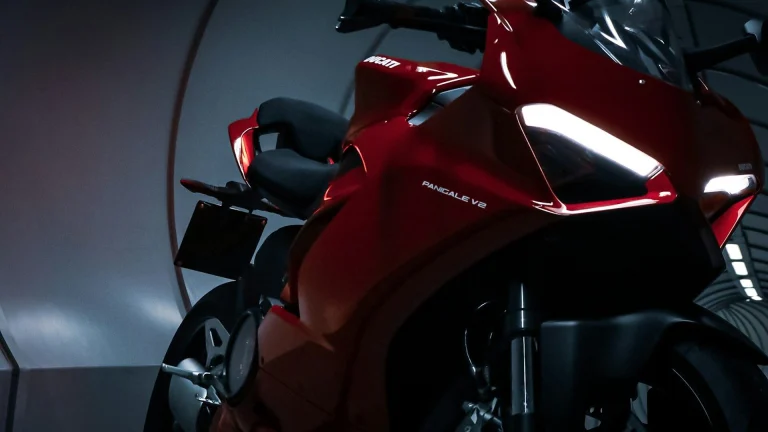 red and black sports bike