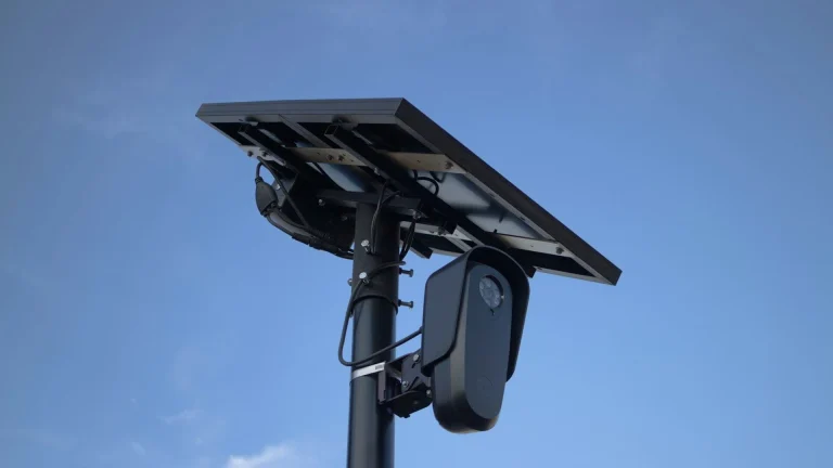 Solar-powered Flock Safety automated license plate reader camera mounted on a pole.