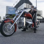 Boss Hoss Cruiser Bike with V8 engine parked outside a racetrack