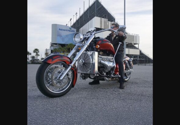 Boss Hoss Cruiser Bike with V8 engine parked outside a racetrack