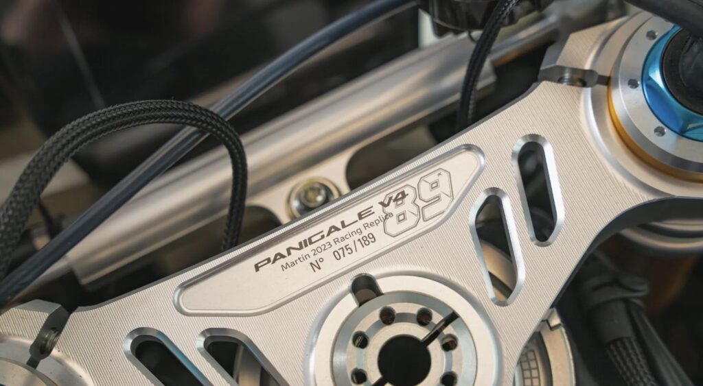 Individually numbered billet triple clamp reading Martín 2023 Racing Replica No. 075/189