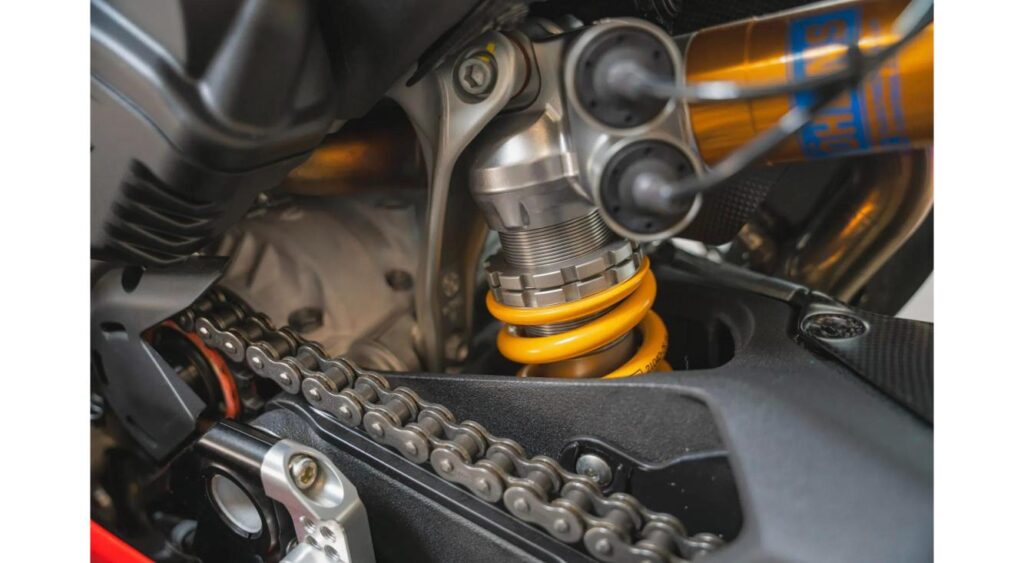 Close-up of the electronically adjustable Öhlins rear shock and swingarm