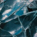 a close up of a broken glass window