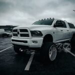 a large white truck parked in a parking lot