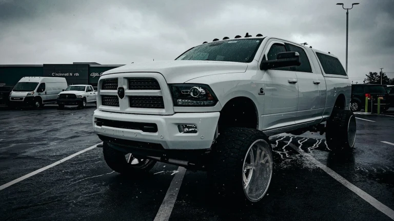 a large white truck parked in a parking lot