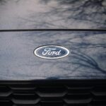 a close up of a ford emblem on a car