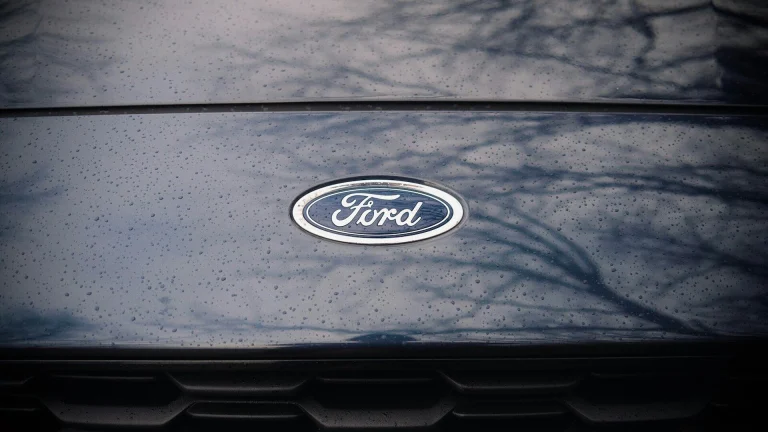 a close up of a ford emblem on a car