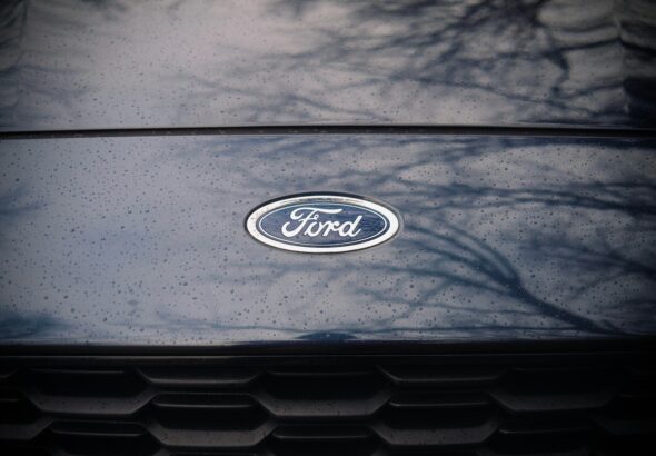 a close up of a ford emblem on a car