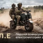 Two Ukrainian soldiers riding the MUL.E all-wheel-drive electric military motorcycle on a dirt road