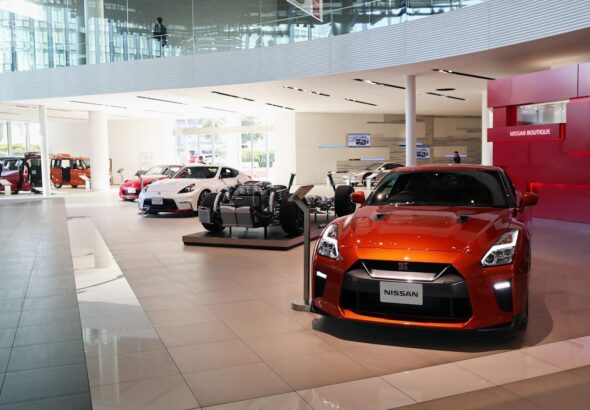 a car showroom filled with lots of cars