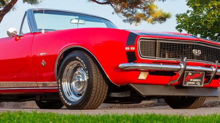 a red car parked on the side of the road