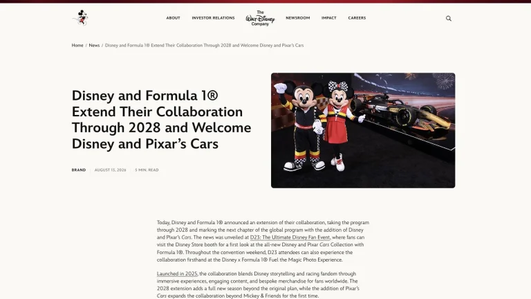 Mickey and Minnie Mouse pose beside the Disney x Formula 1 show car at D23, promoting the Disney and Pixar's Cars collaboration