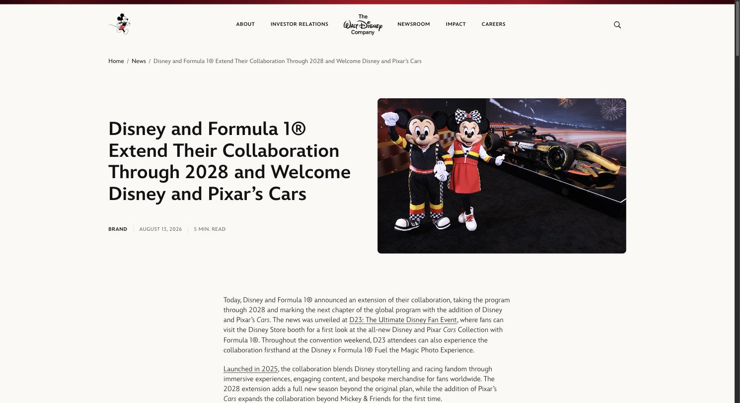 Mickey and Minnie Mouse pose beside the Disney x Formula 1 show car at D23, promoting the Disney and Pixar's Cars collaboration