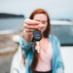 focus photography of black vehicle key
