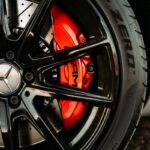 black and red car wheel