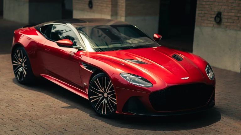 a red sports car parked in front of a building