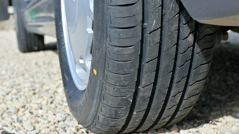 a close up of a tire on a car