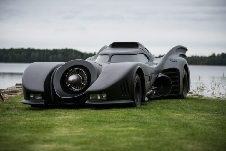 a car that is sitting in the grass