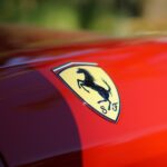red car with yellow and black logo