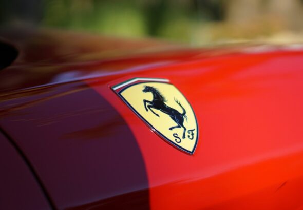 red car with yellow and black logo
