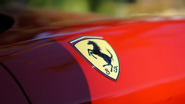 red car with yellow and black logo