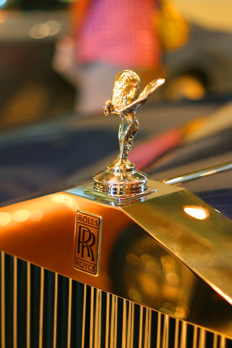 Rolls-Royce Spirit of Ecstasy hood ornament on a Corniche-era grille