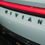 A close up of the rear of a white car