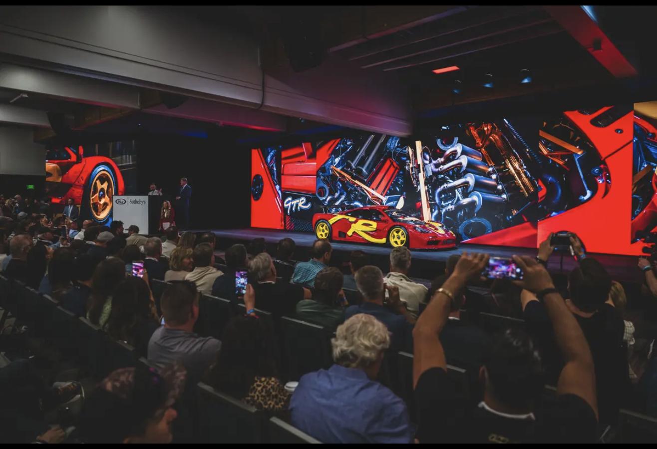 1996 McLaren F1 GTR on the auction stage at RM Sotheby's Monterey 2026 sale, where it sold for $34,655,000