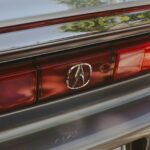 A close-up of an acura car's tail light.