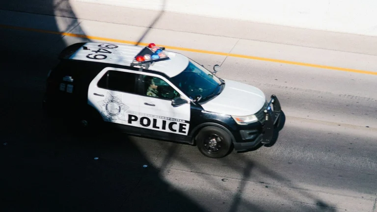 a police car parked on the side of the road